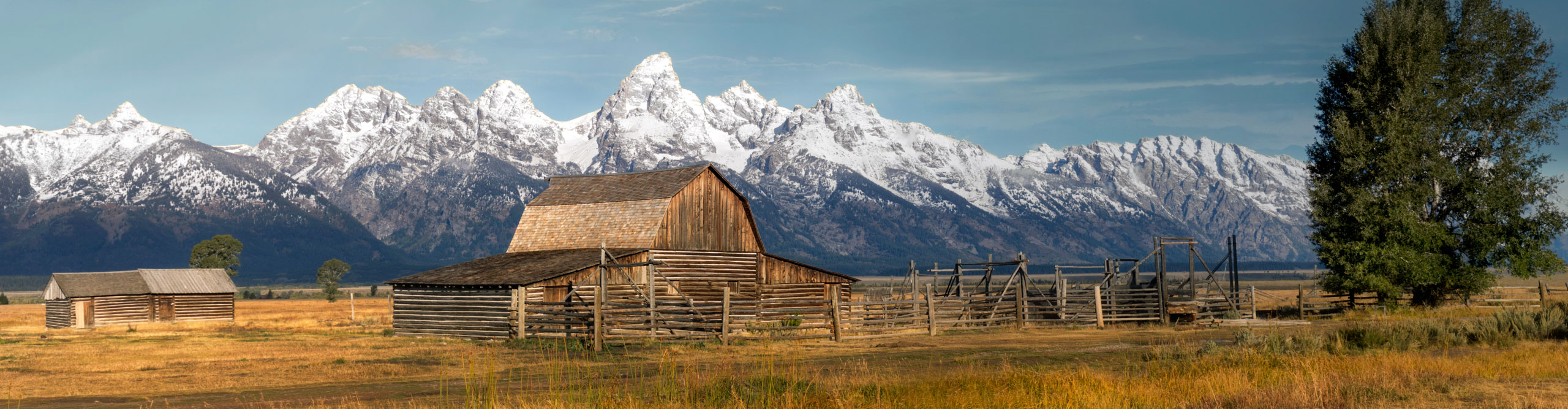Dramatic landscape with mountains and Moulton barn, Mormon Row, Grand Teton National Park, Wyoming