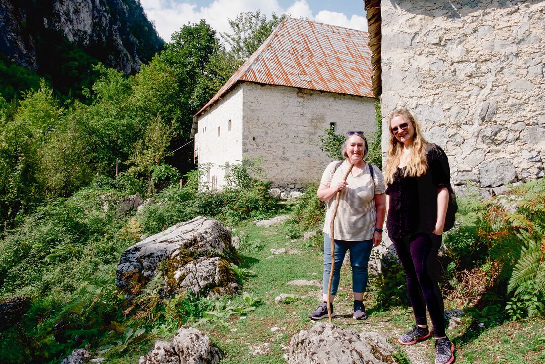 Intrepid travellers pause for a photo in Valbona Valley, Albania