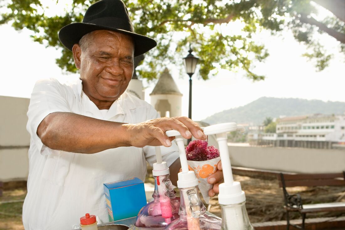 Snow cone vendor prepares drink, Panama city