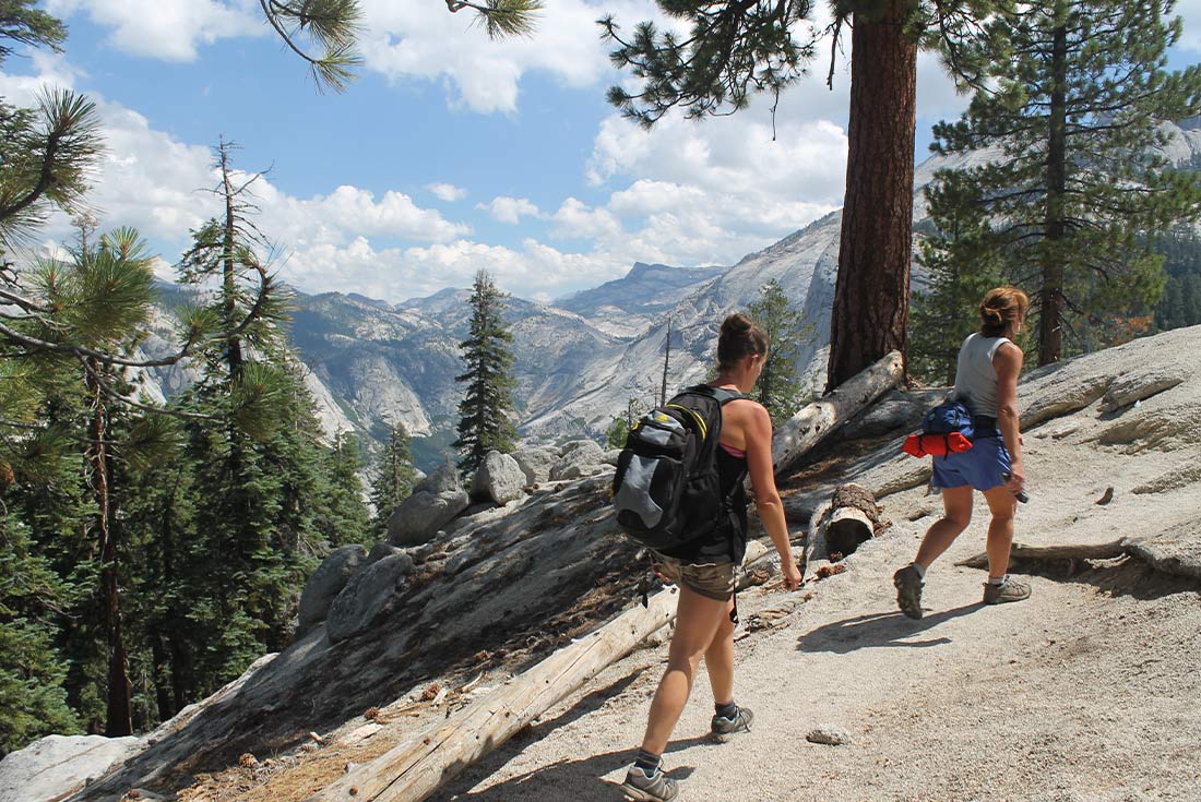 Two female travellers hiking in Yosemite NP