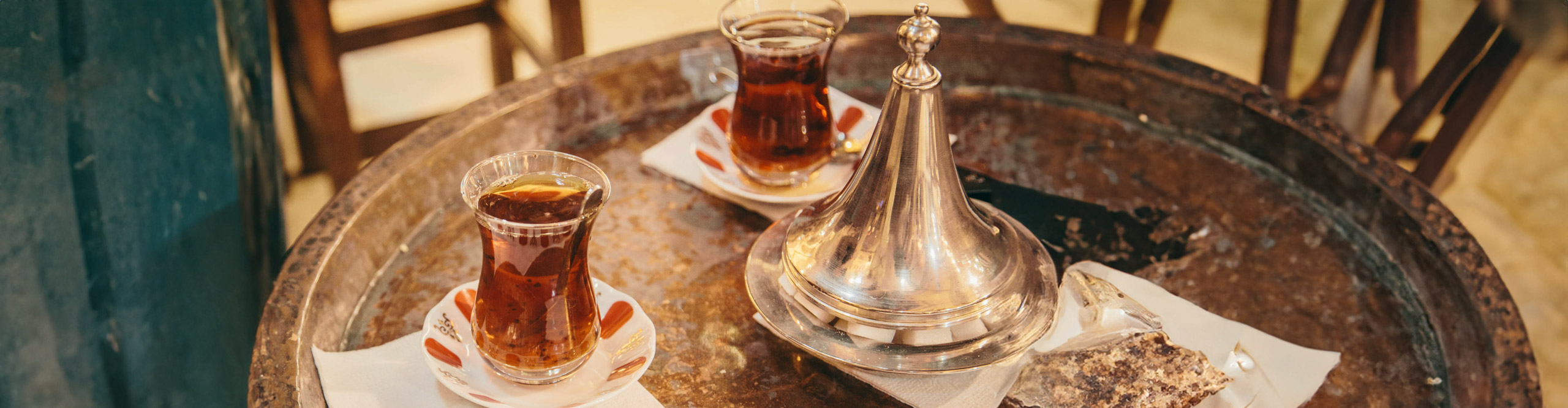 Turkish tea on a silver platter with a teapot 