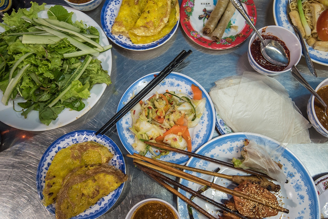 A spread of local vietnamese food in Hoi An, Vietnam as seen on an Intrepid Travel tour