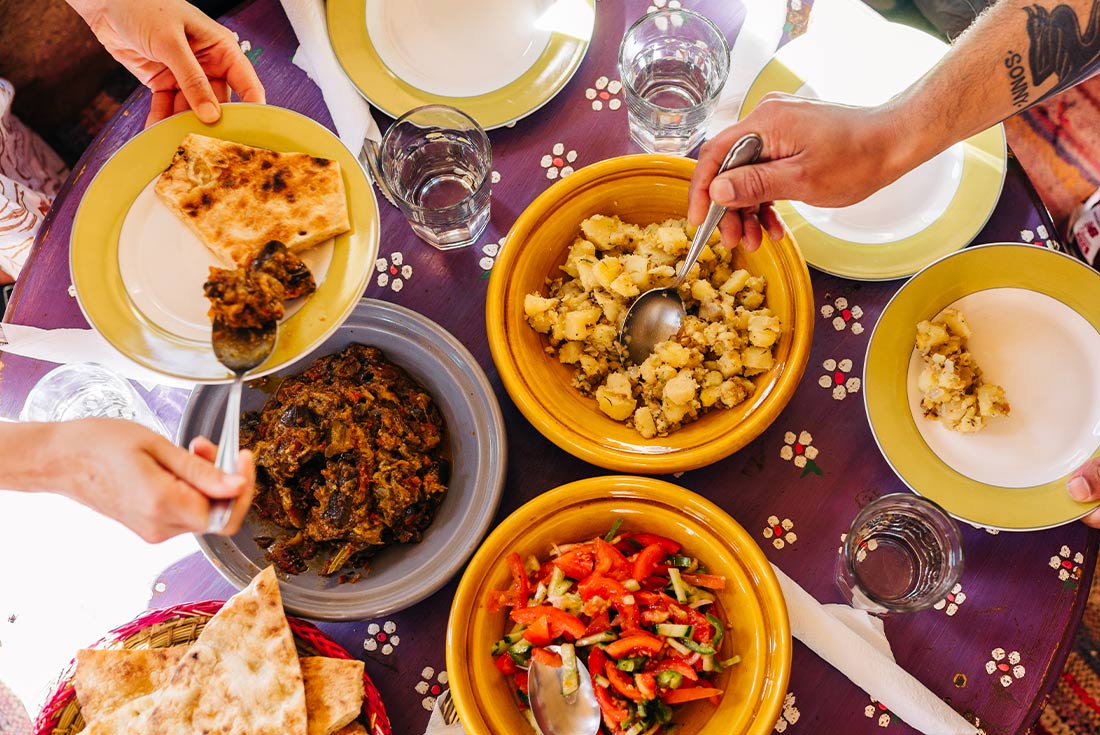 Enjoying a delicious home-cooked meal in Morocco