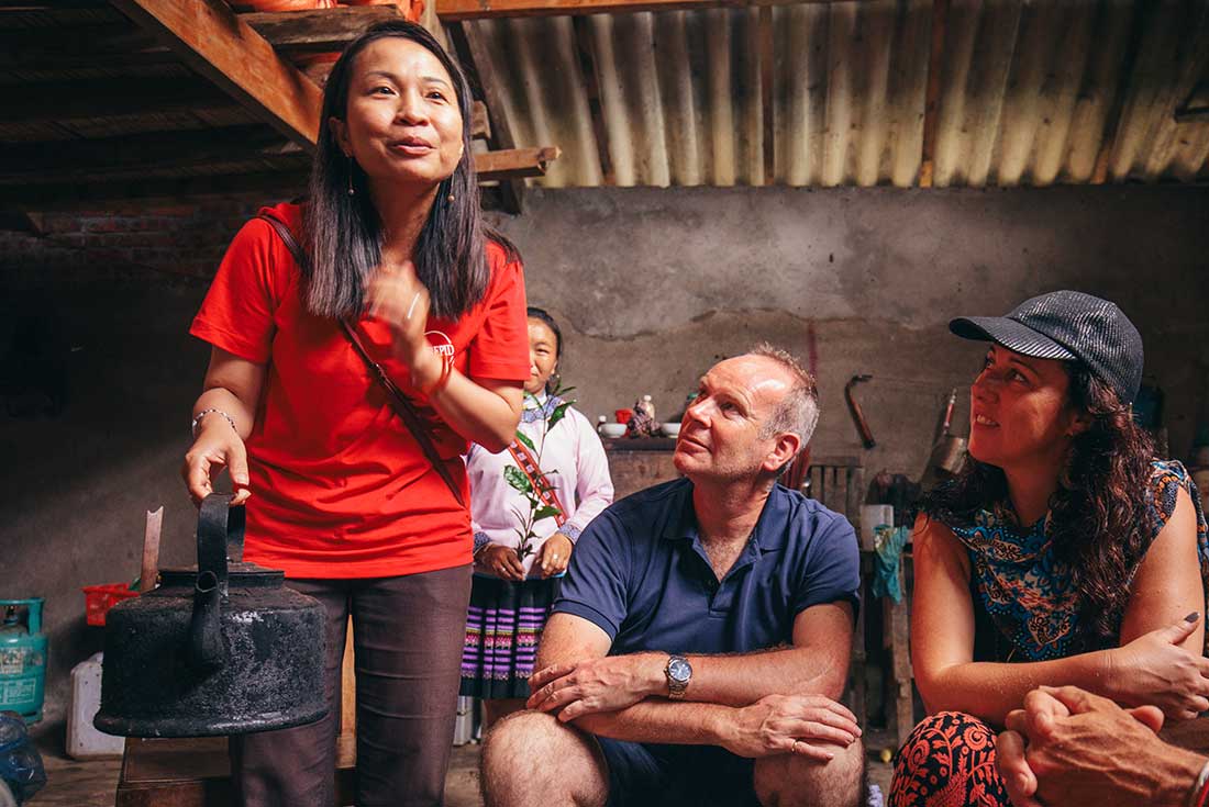 Travellers enjoy tea with locals from Sapa