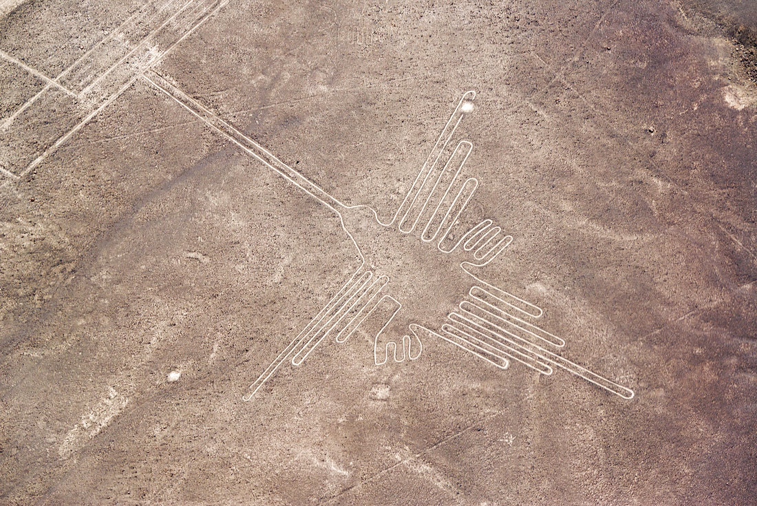 Aerial view of hummingbird Nazca Lines in the desert, Peru