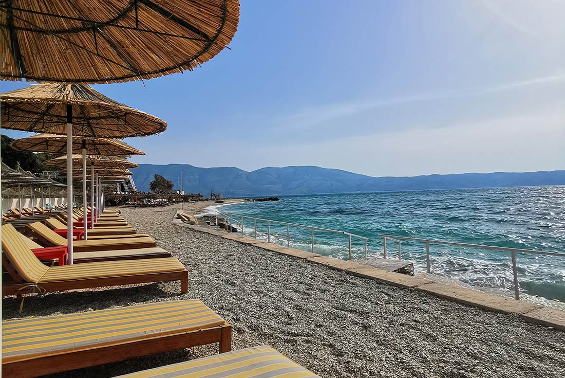 Beach loungers in Valora Bay, Albania