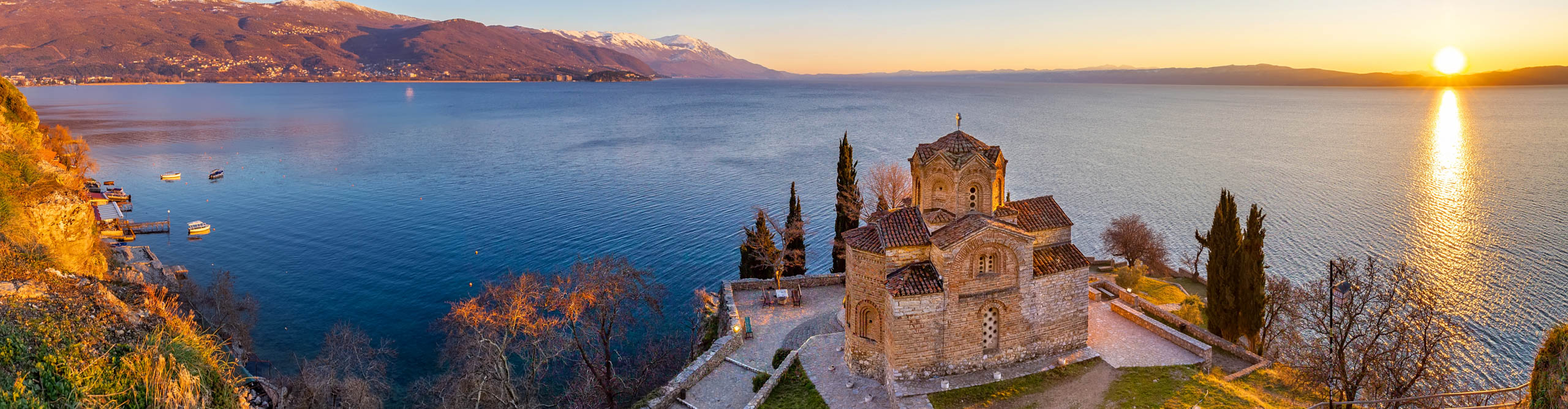 Sunset view of the Church of St John the Theologian at Kaneo with blue lake Ohrid, North Macedonia