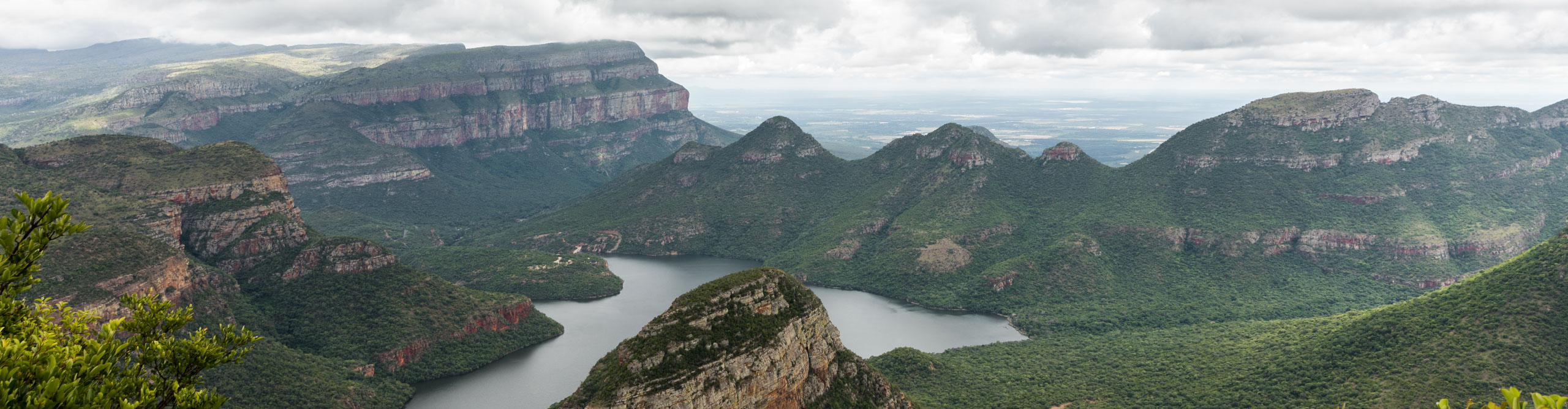 Cloudy weather over mountains and a lake in South Africa