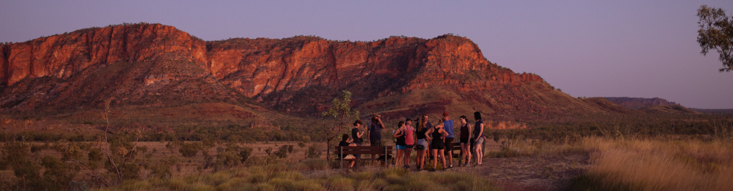 Group in the Kimberley's during at red sunset in Western Australia 