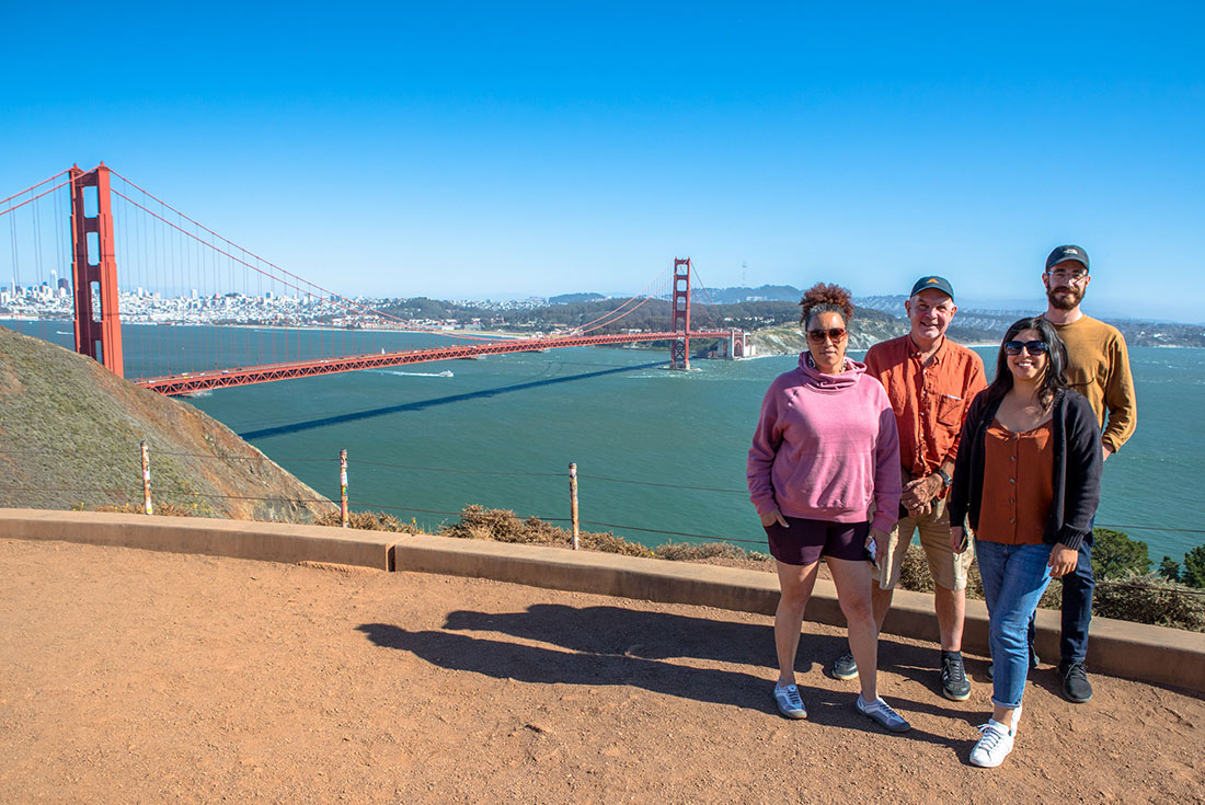 Travellers at the lookout in front of Golden Gate Bridge, California, USA