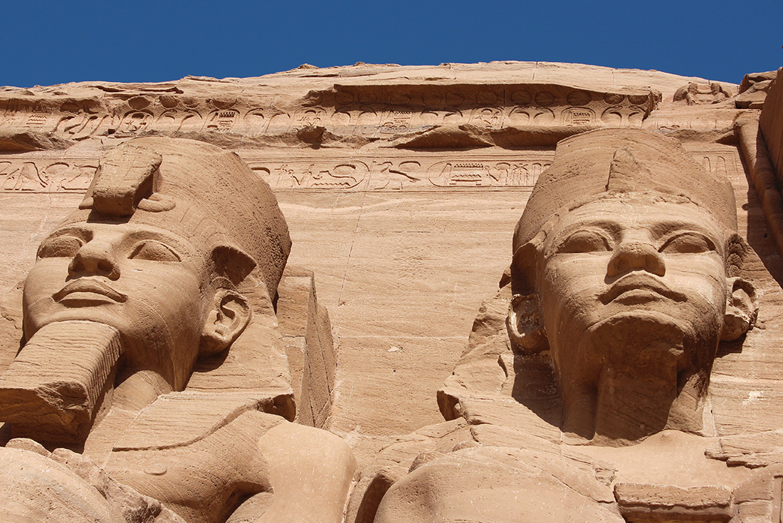 The huge carved faces of Abu Simbel in Aswan, Egypt