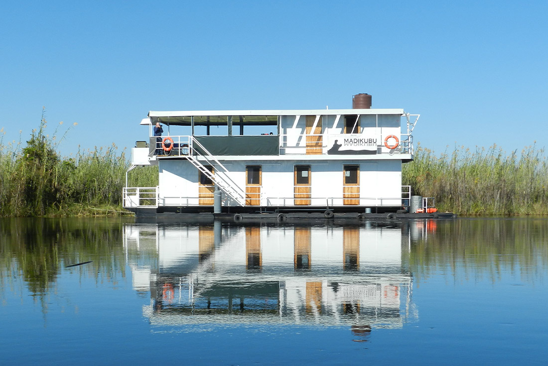 View of the houseboat on water in Okavango Delta, Botswana