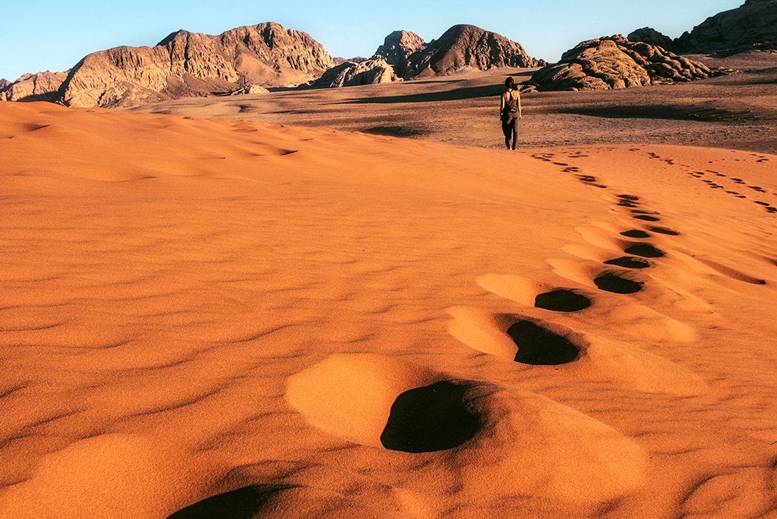 Walk across the amazing sand dunes in the deserts of Jordan