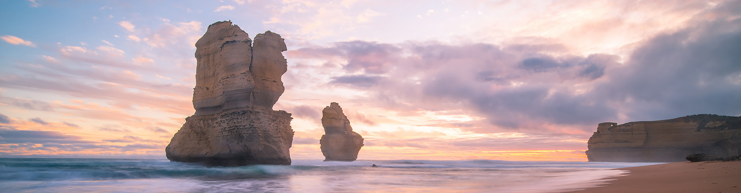 Gibson steps, Twelve Apostles at sunset with pink and blue clouds, the great ocean road, Australia.