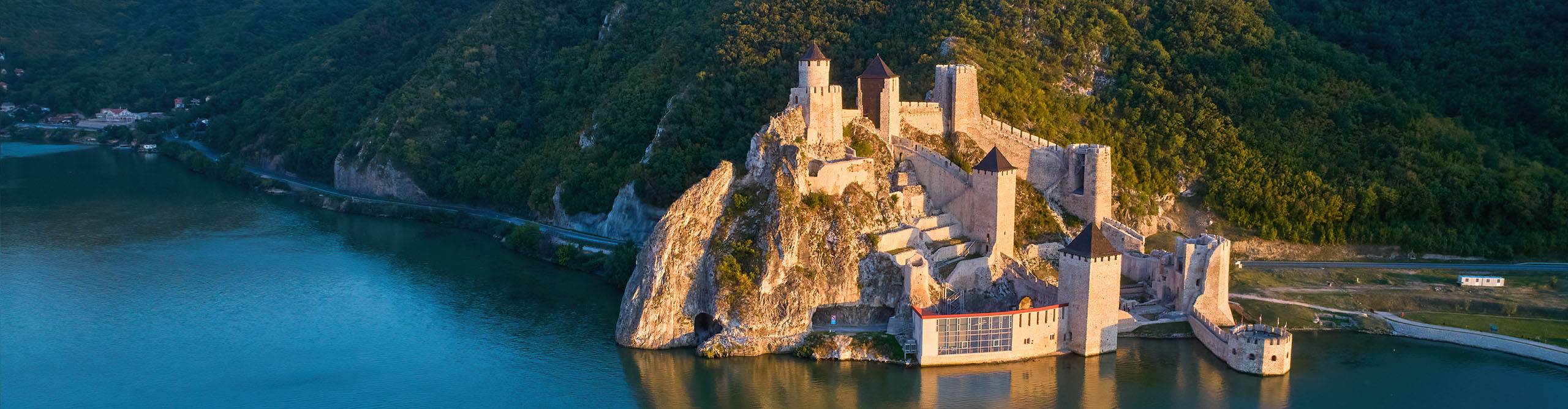 Aerial view of medieval fortress of Golubac, mirroring in the waters of the Danube lake, Serbia.