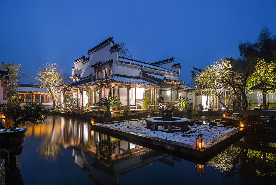 CPBY - Feature stay: Weiyan Shilily Heritage Hotel exterior at night