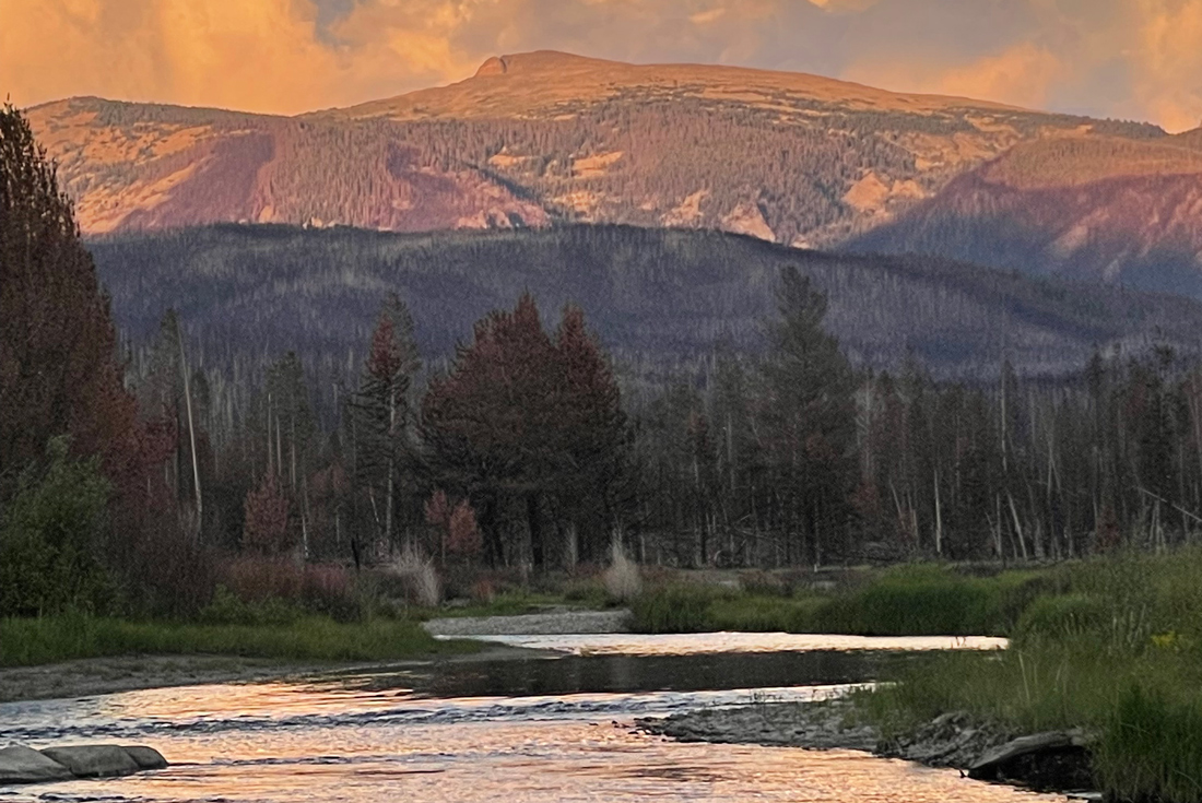 View of Mount Ida beside the river in the valley, Colorado, USA