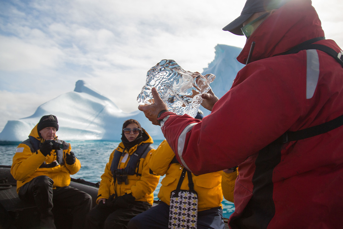 Travellers on a zodiac ride in Greenland