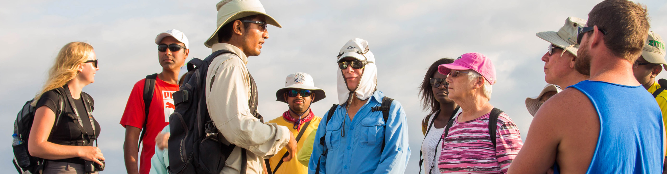 Group talking with their guide in the Galápagos Islands 