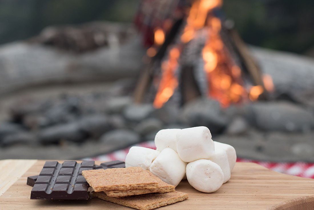 Make some delicious smores on a beach bonfire