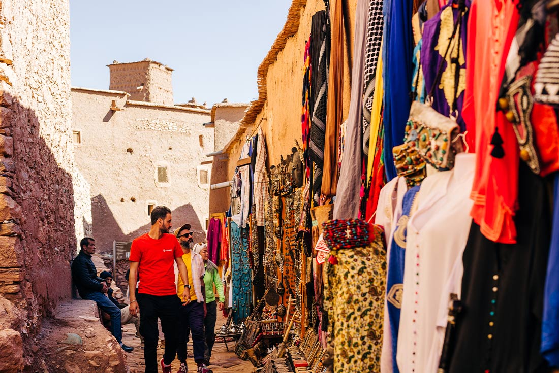 Travellers in the market streets, Air Benhaddou, Morocco