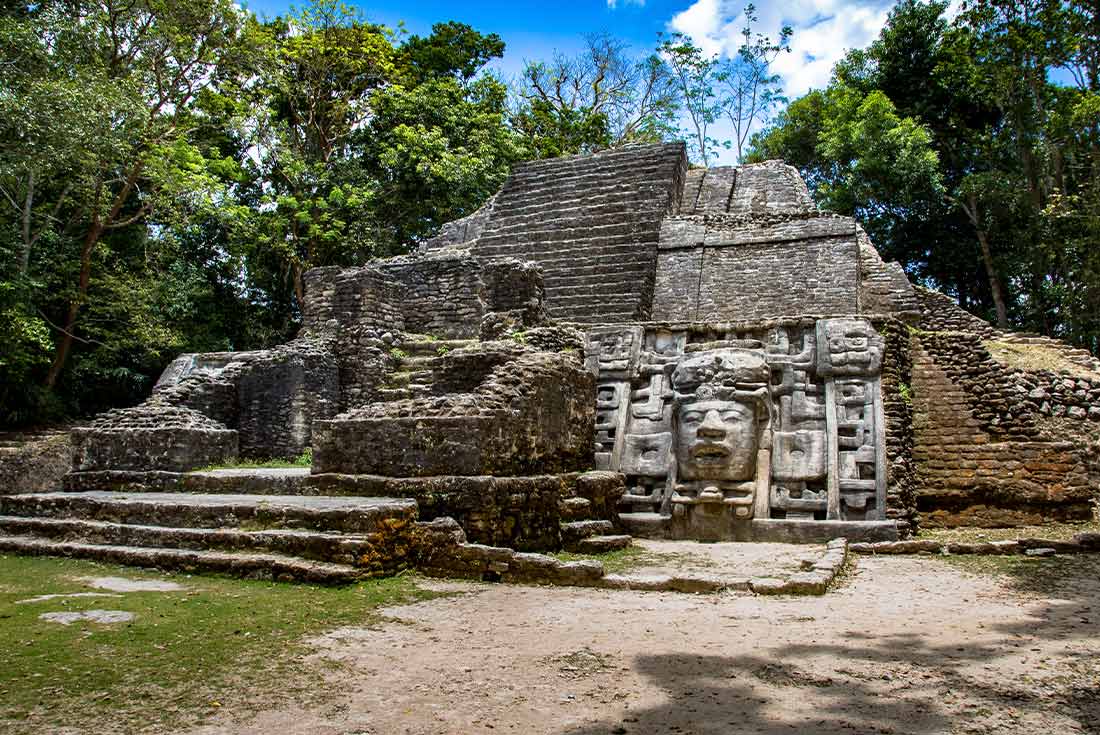 Mayan mask temple in the Lamanai Ruins, Belize