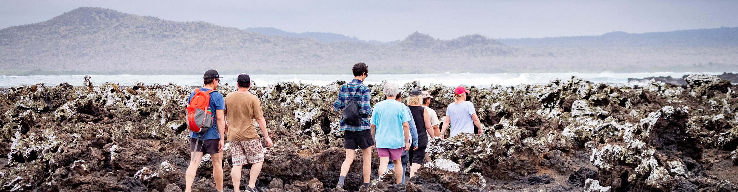 Group walking along the rocks, Galapagos