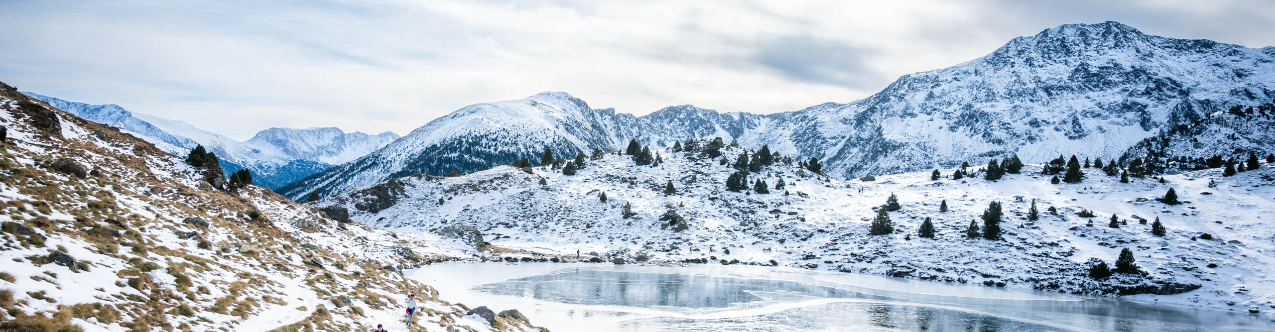 Snow-covered Tristaina lakes, located in the mountains of Ordino, in Andorra.