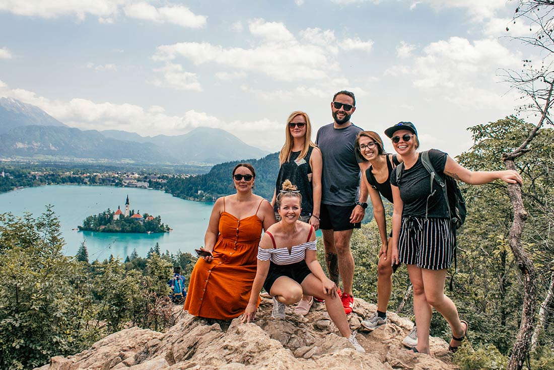 Travellers posing on hike to Lake Bled, Slovenia