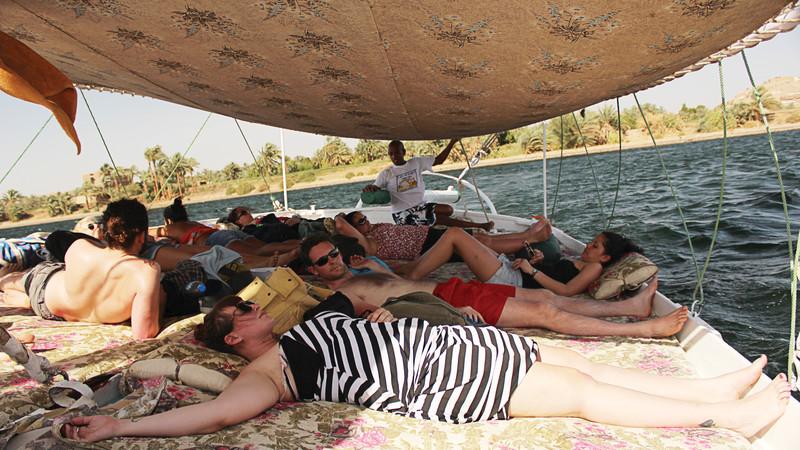 Travellers relaxing on a felucca