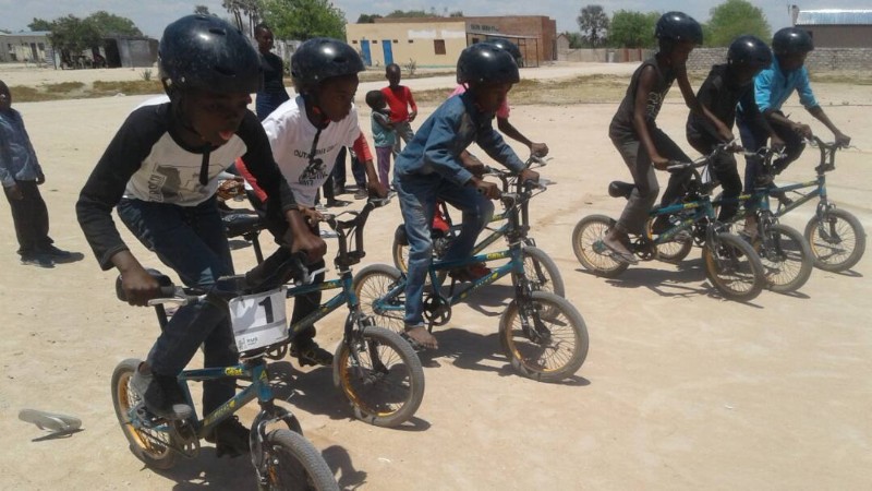 Kids racing on their bikes