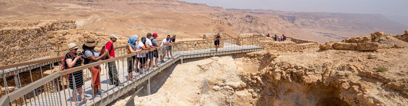 XEPIC - Group lookout over clifftop fortresses of Masada, Israel