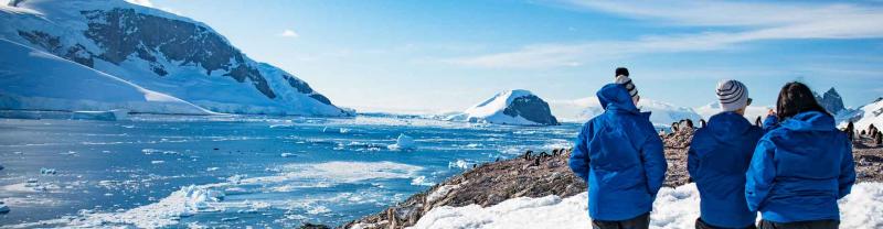 Polar cruise passengers admire the scenery in Antarctica