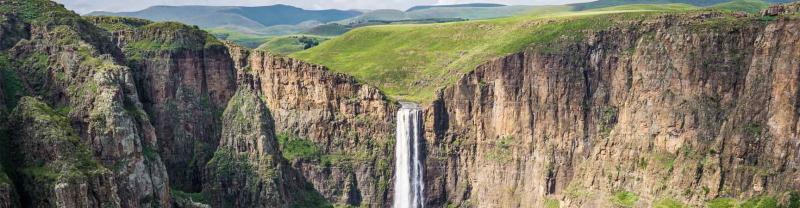Green hills and flowing waterfall of Maletsunyane Falls, Lesotho