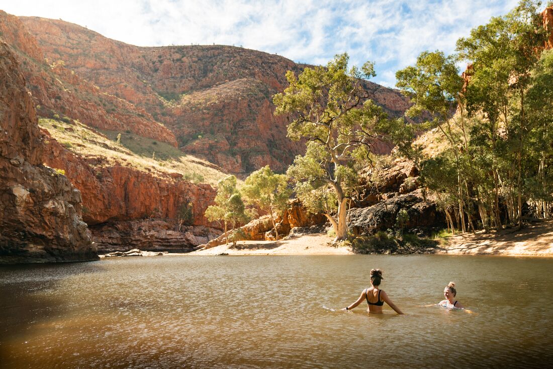 Travellers enjoying a swim in the Red Centre