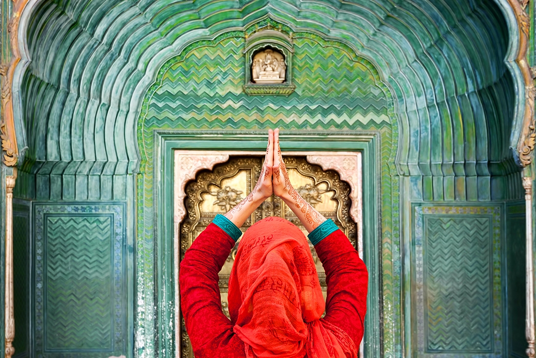 Woman praying at a temple in Rajasthan in India