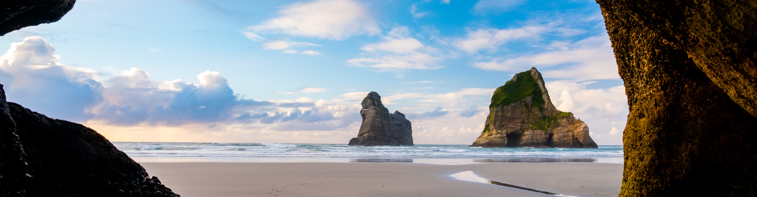 The beautiful Wharariki Beach with famous rocks at Sunset, Nelson, South Island, New Zealand.