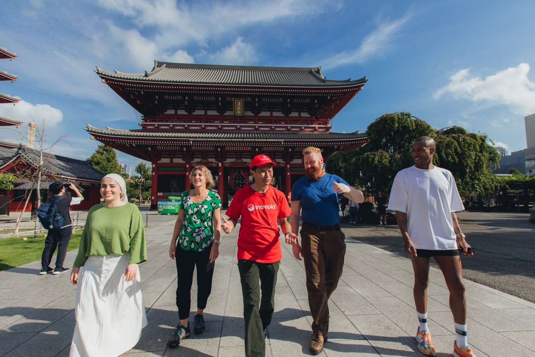 Group of Intrepid travellers and leader exploring Sensoji Temple in downtown Tokyo