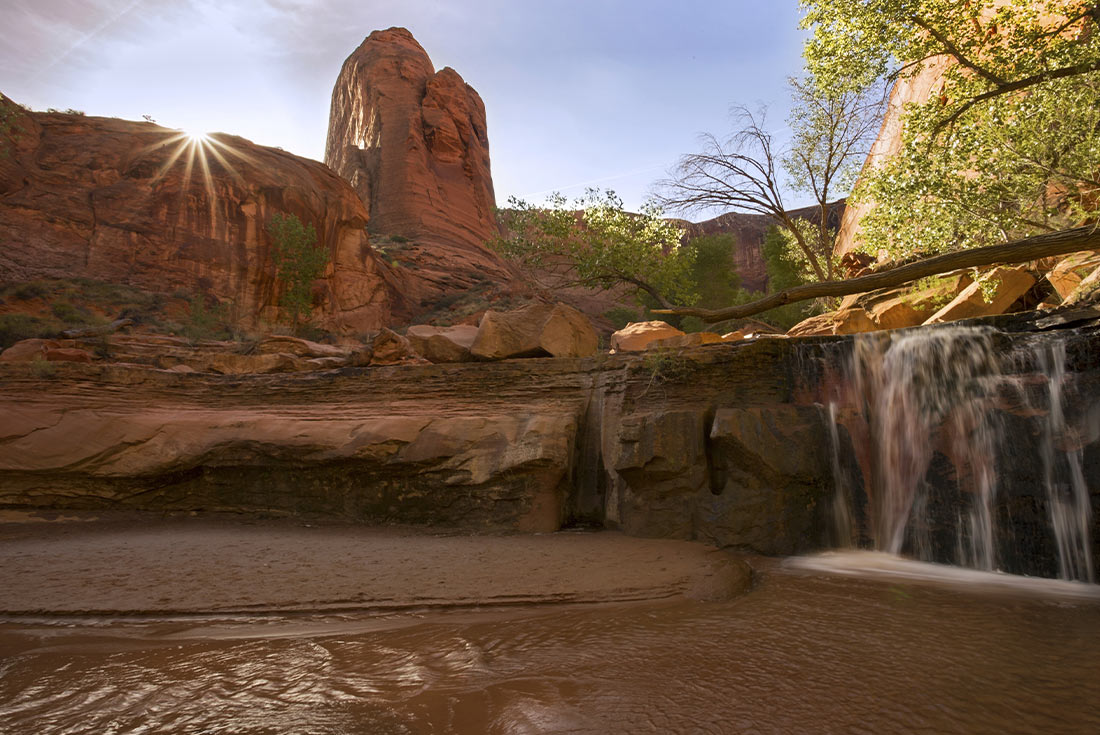 Waterfall on the hiking trail to Escalante River, Coyote Gulch, Utah, U.S.A.