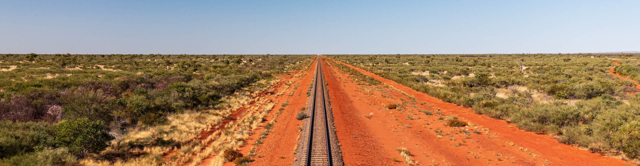 Train tracks in the red desert of the Australian Outback