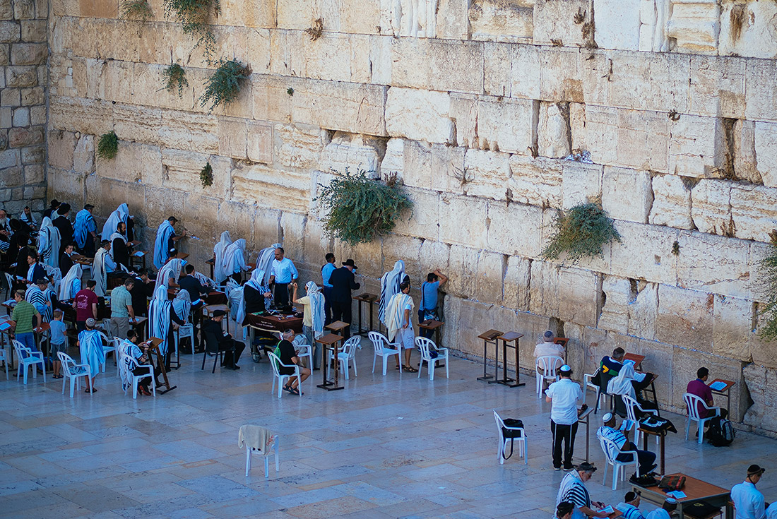 Groups of people praying at the Wailing Wall, Jerusalem, Israel