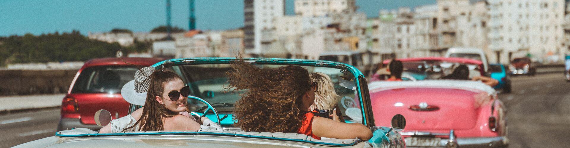 Four women in a convertible car in Havana
