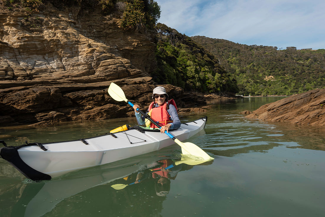 Kayaking across Marlborough Sounds, South Island, NZ