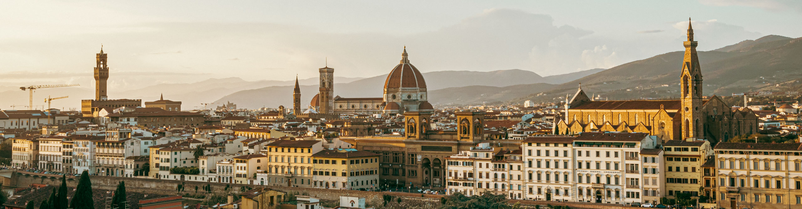 View of the city and rooftops at sunset, in Florence, Italy 
