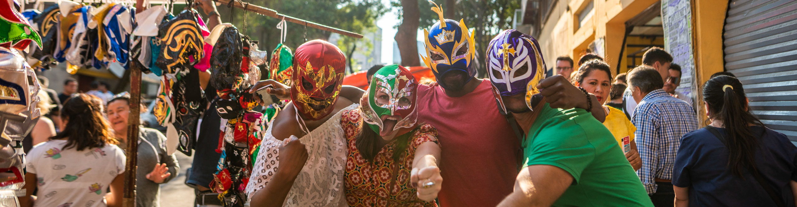 Group in Lucha libre masks in the street in mexico 
