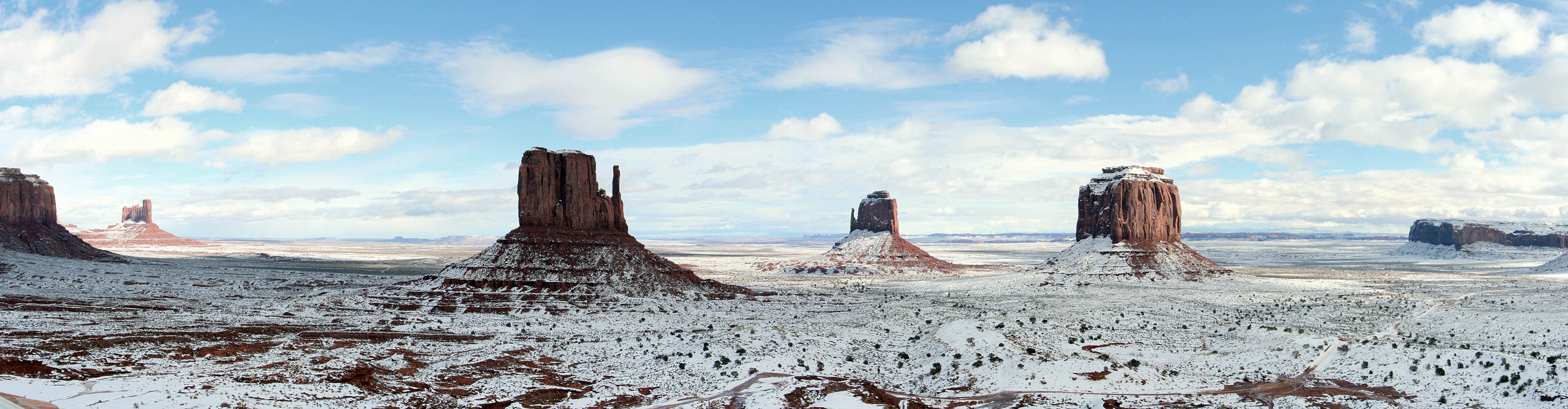  Monument Valley in the snow, on a clear sunny day, Arizona, USA 