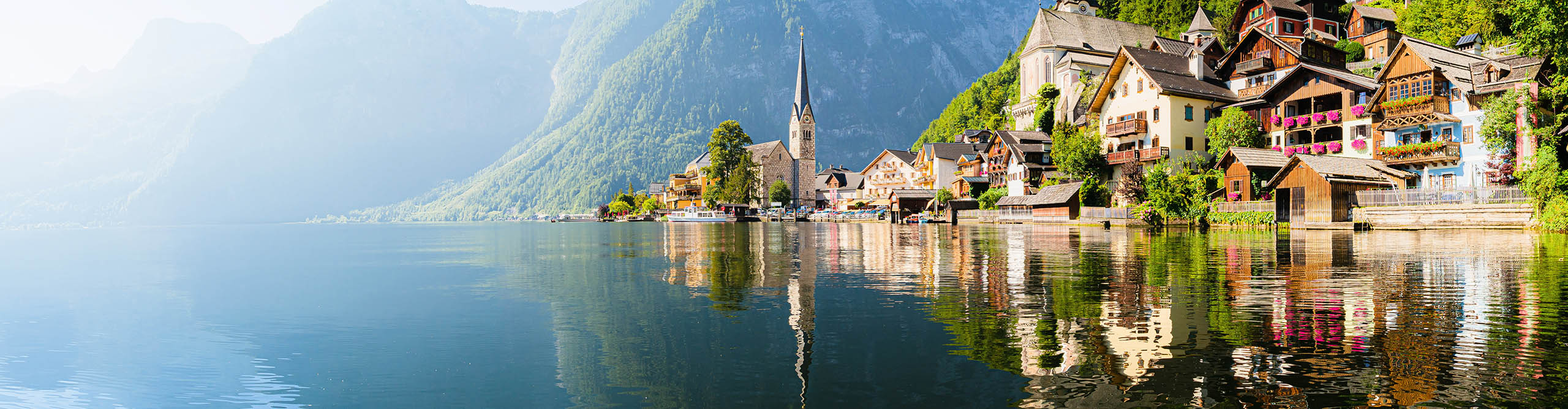 Hallstattersee lake in the Austrian Alps in scenic morning light on a beautiful sunny day in summer