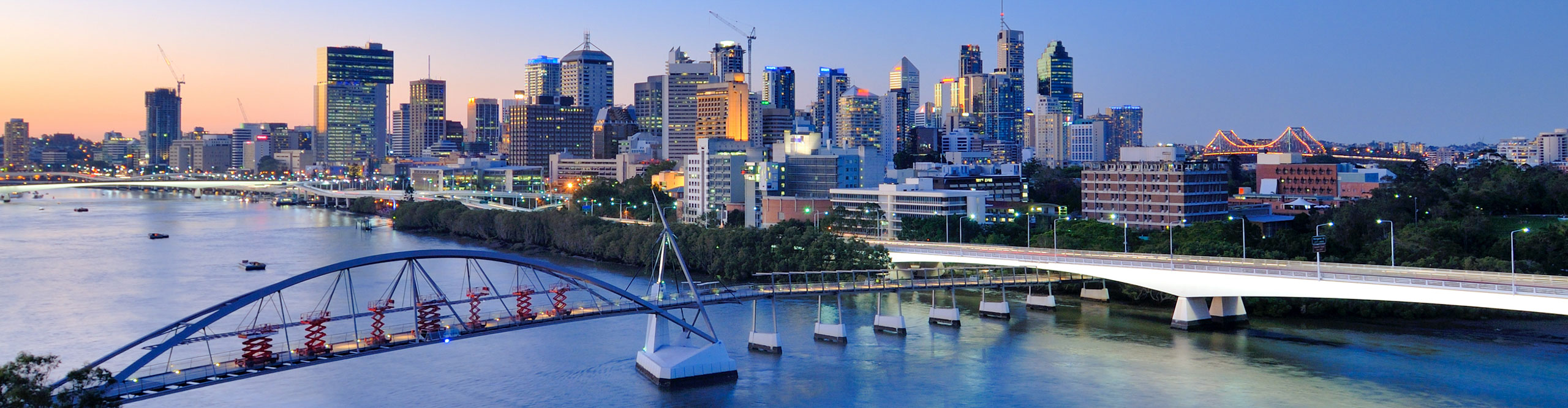 Brisbane city skyline and Brisbane river viewing from Kangaroo Point, Queensland at sunset