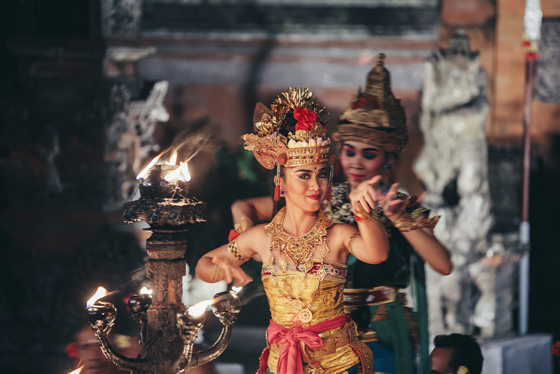 Women performing traditional Balinese dancing in traditional costume