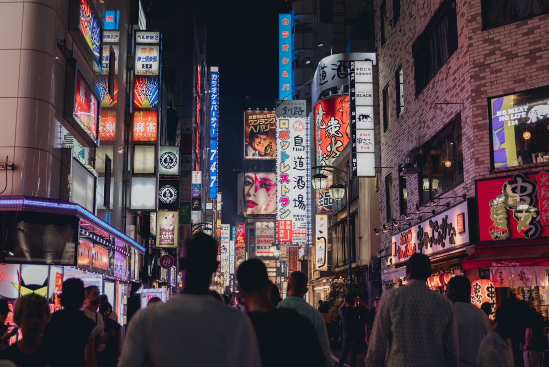Intrepid travellers get lost in the neon packed streets of Shibuya in Tokyo